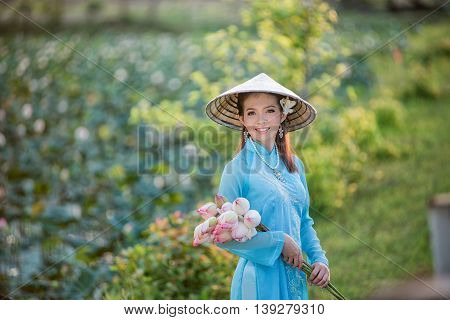 Asian Office Woman, Ao Dai Is Famous Traditional Costume For Woman In Vietnam