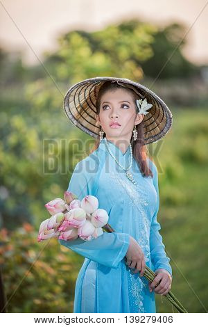 Asian Office Woman, Ao Dai Is Famous Traditional Costume For Woman In Vietnam