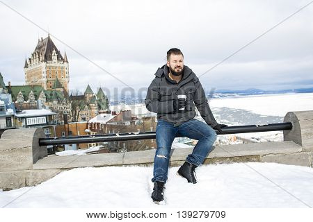 A Gorgeous young man looking outdoors in winter season