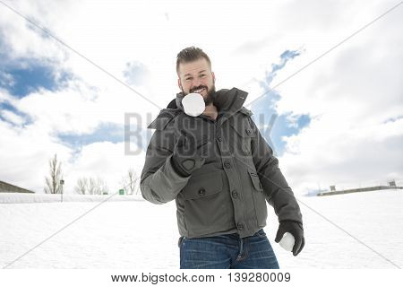 A Gorgeous young man looking outdoors in winter season