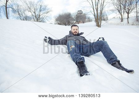 A Gorgeous young man looking outdoors in winter season