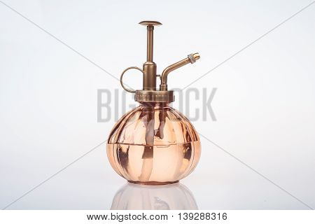 Vintage Perfume Bottle With Atomizer Isolated On White Background