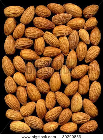 image of almonds isolated on a black background