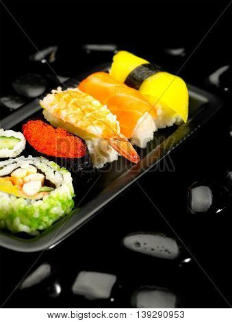 close up image of assorted sushi plate