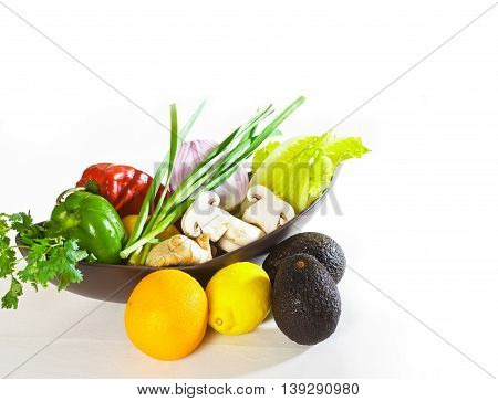 assorted vegetables and fruits isolated on a white background