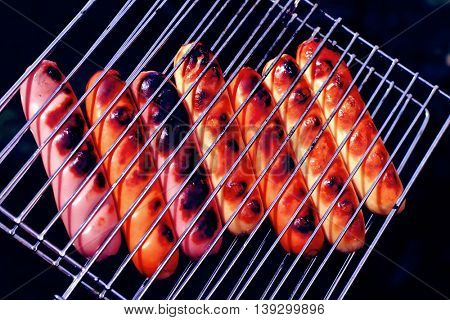 grilled beef pork sauseges with marks
