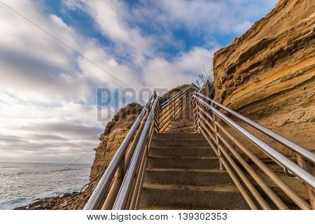 Side of cliff at Ladera Street with staircase, Sunset Cliffs in San Diego, California.