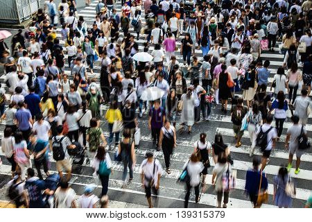 Asian People Are Across The Crosswalk