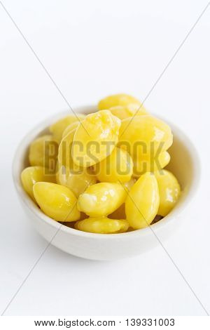 Gingko Nuts in a Bowl on White Background.