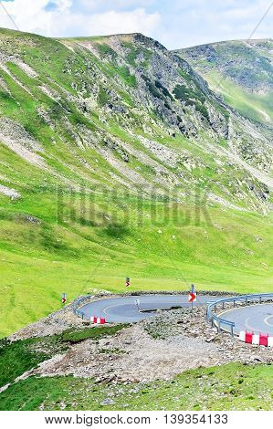 Tranalpina mountain road in Romania in summer with the hairpins of it's highest point Urdele Pass