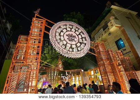 KOLKATA INDIA - OCTOBER 18 2015 : Night image of decorated Durga Puja pandal shot at colored light at Kolkata West Bengal India. Durga Puja is biggest religious festival of Hinduism.