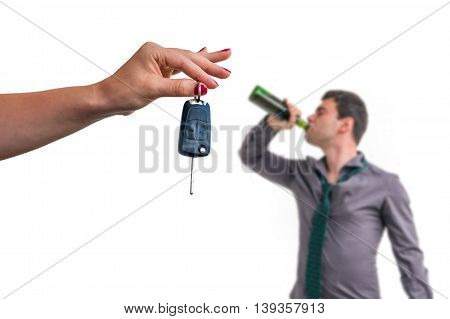 Wife Showing Car Keys And Her Husband Drinking Alcohol