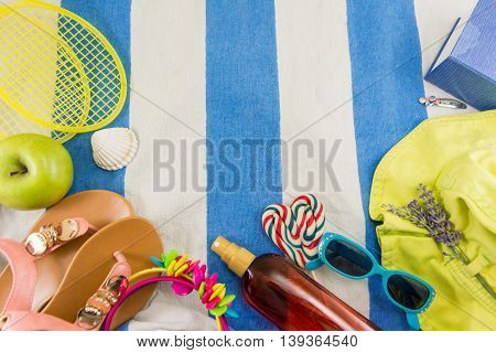 Summer Accessories On Beach Towel