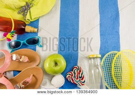 Summer Accessories On Beach Towel