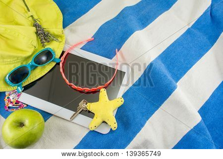 Summer Accessories On Beach Towel