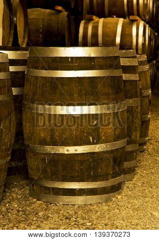 One Wine barrel stacked in the old cellar of the winery.