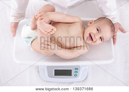 Measuring Smiling Beautiful Comfortable Little Baby