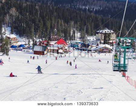 SHEREGESH RUSSIA - February 29 2016: The view from the main slopes in town hotel Sheregesh ski resort.