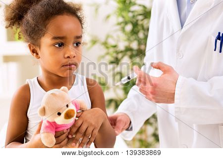 Brave Little Girl Receiving Injection