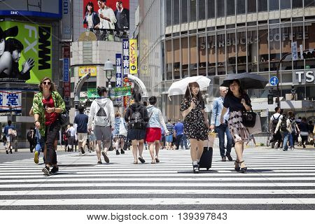 TOKYO, JAPAN - May 18, 2016: Shibuya, It's the shopping district which surrounds Shibuya railway station. This area is known as one of the fashion centers and major nightlife of Japan on May 18, 2016.
