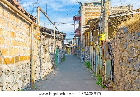 The narrow street of the old neighborhood full of slums located in Yerevan Armenia.