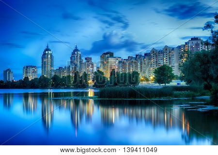 Kyiv. Late evening on the bank of Dnieper river at Obolonskaya Embankment. Capital of Ukraine Kiev.
