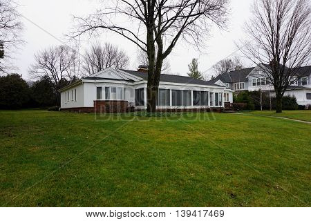 WEQUENTONSING, MICHIGAN / UNITED STATES - DECEMBER 22, 2015: A home on Beach Drive in Wequetonsing, Michigan.