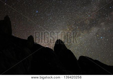 Scenery of milkyway at summit of Mountain Kinabalu,Ranau,Sabah,Borneo. Image contains visible noise due to high ISO, soft focus, shallow DOF, slight motion blur.