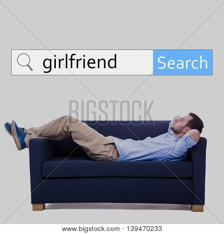 Internet And Online Dating Concept - Search Bar And Man Lying On Sofa And Dreaming About Girlfriend