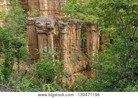 Soil Columns with 30 meter height called The Roman caused by deposition of sediment in late Tertiary Period at Pha Chau, Pha Chor Canyon, Mae Wong National park, Chiang Mai, Thailand