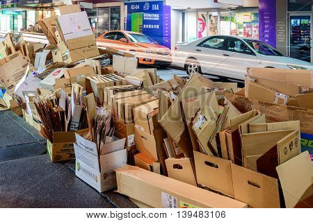 Adelaide South Australia - August 11 2015: Recyclable waste collection day in Adelaide city. Night view of the street with paper boxes