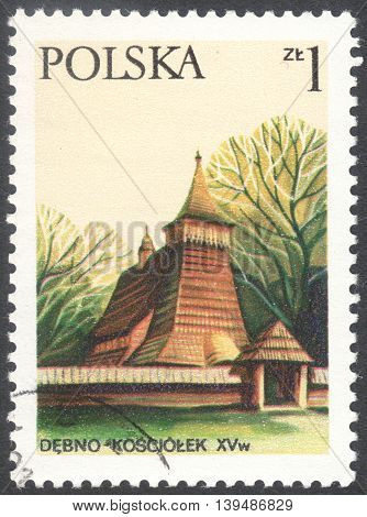 MOSCOW RUSSIA - CIRCA FEBRUARY 2016: a post stamp printed in POLAND shows a wooden church in Debno the series 