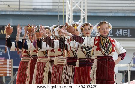 ZAGREB, CROATIA - JULY 22: Members of folk group Etnos from Skopje, Macedonia during the 50th International Folklore Festival in center of Zagreb, Croatia on July 22, 2016