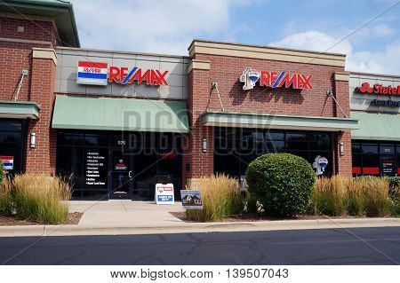 SHOREWOOD, ILLINOIS / UNITED STATES - AUGUST 30, 2015: One may buy or sell real estate with the assistance of Remax realtors, in a Shorewood strip mall.