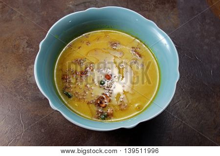 Yellow Lentil soup or Arhar Daal fry with the tadka of cumin seeds garlic and green chilies