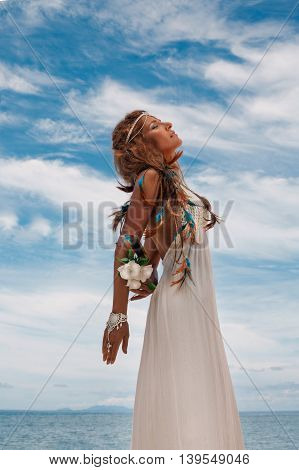 beautiful young woman in white dress outdoors portrait