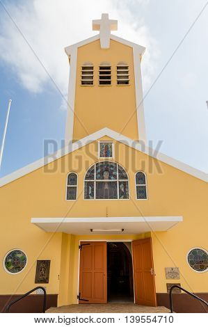 A small yellow Catholic chapel on Aruba