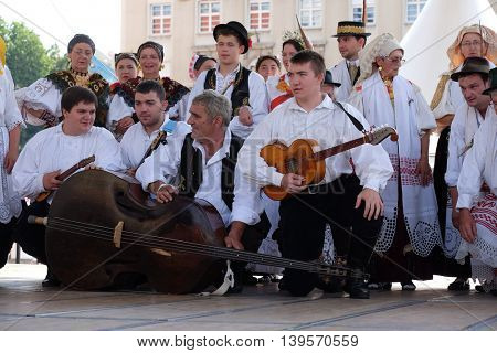 ZAGREB, CROATIA - JULY 23: Members of folk group Kolo from Donja Bebrina, Croatia  during the 50th International Folklore Festival in center of Zagreb, Croatia on July 23, 2016