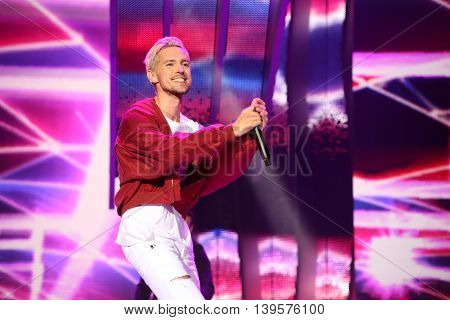 VITEBSK, BELARUS - JULY 17: Latvian pop singer Markus Riva performs during the 25th Slavyansky Bazar Festival on July 17, 2016 in Vitebsk, Belarus