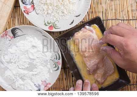 pork and flour with bread crumb for cooking tongkatsu / Cooking Japanese pork curry concept