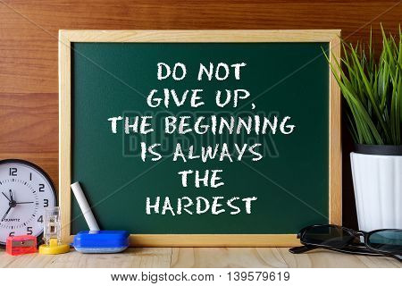 Word Quote Do Not Give Up,the Beginning Is Always The Hardest Written On Green Chalk Board On Wooden