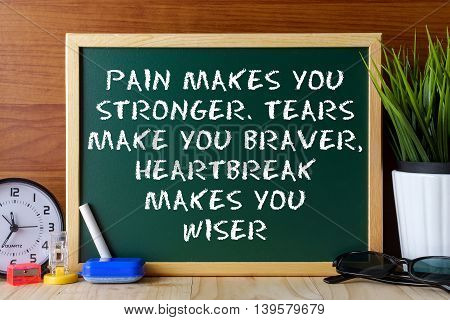 Word Quote Pain Makes You Stronger,tears Make You Braver,heartbreak Makes You Wiser Written On Green