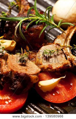 roasted lamb chop in a pan with vegetables