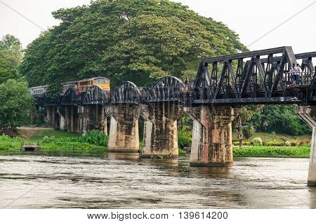 Trains for travel running on the old bridge over the River Kwai Yai is a historical attractions during World War 2 the famous of Kanchanaburi Province in Thailand