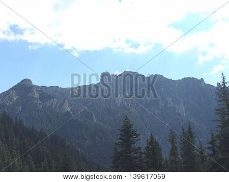 Romania, August 25, 2015, Ceahlau Mountains, Moldova, The top of the mountains meeting the sky