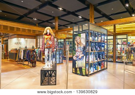 MACAO, CHINA - FEBRUARY 16, 2016: inside of Shoppes at Sands Cotai Centra. Shoppes at Sands Cotai Central is a large shopping mall in Macao