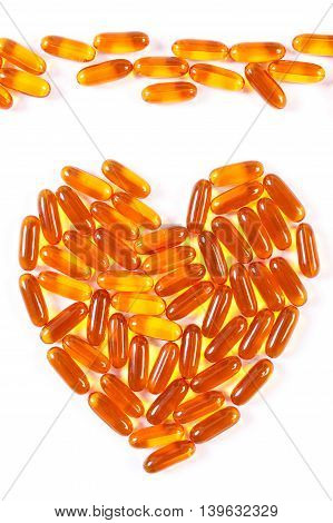 Heart Shaped Medical Pills And Capsules On White Background, Health Care Concept
