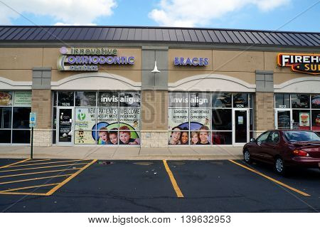 JOLIET, ILLINOIS / UNITED STATES - AUGUST 30, 2015: One may have one's teeth straightened at the Innovative Orthodontic Center in a Joliet strip mall.