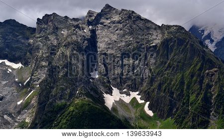 Steep slopes in the mountains. Dombay the Republic of Karachay-Cherkessia in the North Caucasus Russia. Photo taken on: July 26 Friday 2013