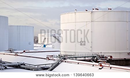 White Tanks In Tank Farm With Snow In Winter